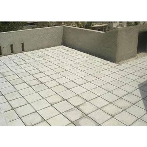 Concrete roof tiles laid in rows